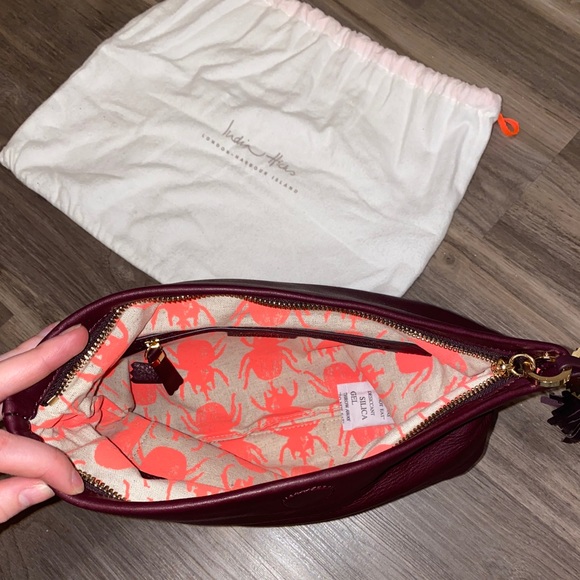 India Hicks Leather Tassel Clutch